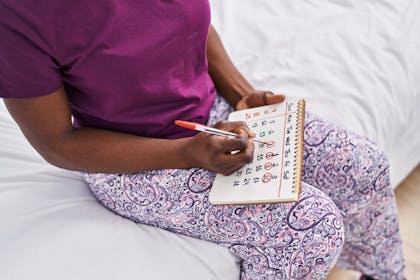 Woman checking calendar