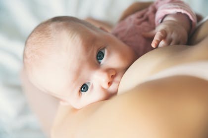 close up of baby being breastfed