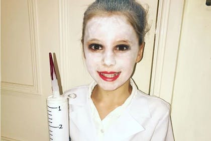 Little girl dressed as The Demon Dentist