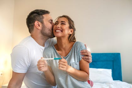 Couple with a positive pregnancy test