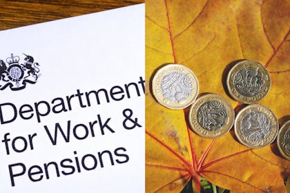 Department for Work and Pensions logo and pound coins on autumn leaf