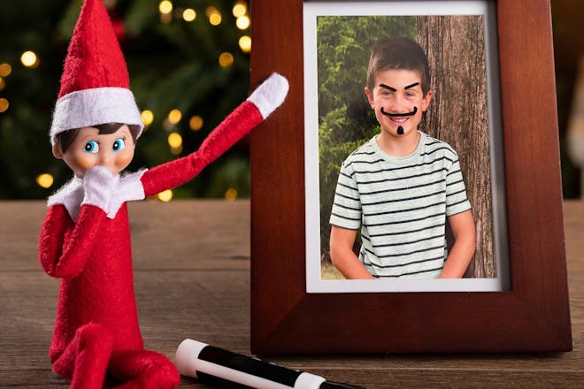 Elf on the Shelf defacing photo
