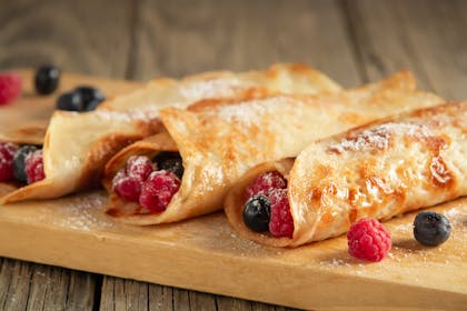 Pancake rolls stuffed with berries