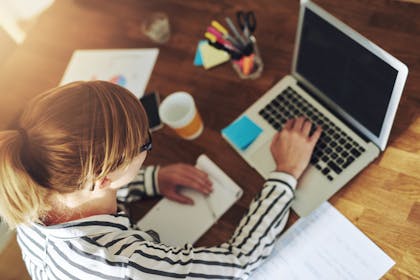 Woman working from home on a laptop