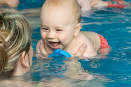 smiling baby in water