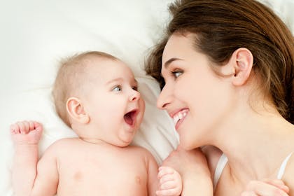 mum and baby smiling