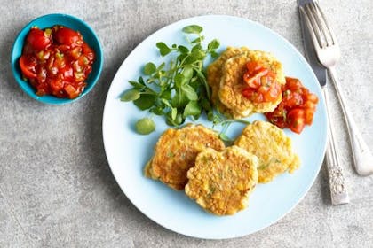 sweetcorn fritters on a plate with relish