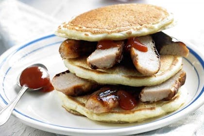 American-style sausage pancakes with tomato sauce