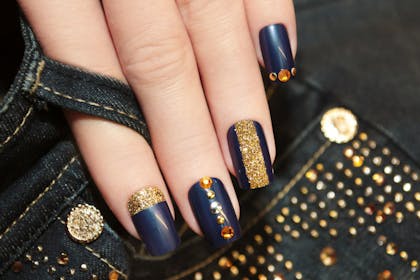 19. Blue and gold glitter nails