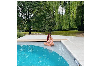 Stacey Solomon with Rose by pool
