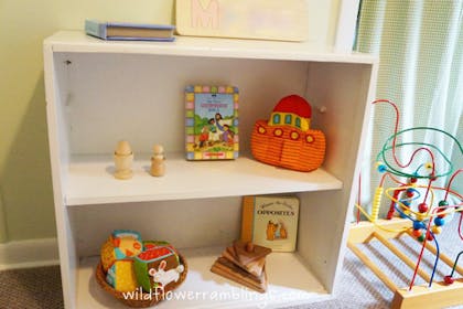 Low shelving unit with Childs toys displayed