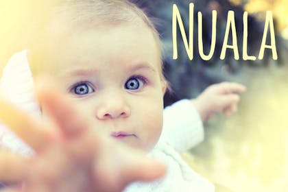 baby reaching with Irish name Nuala