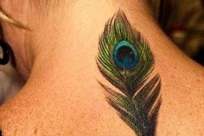 Peacock feather tattoo
