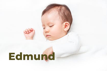 Sleeping baby with white blanket. Name Edmund written in text