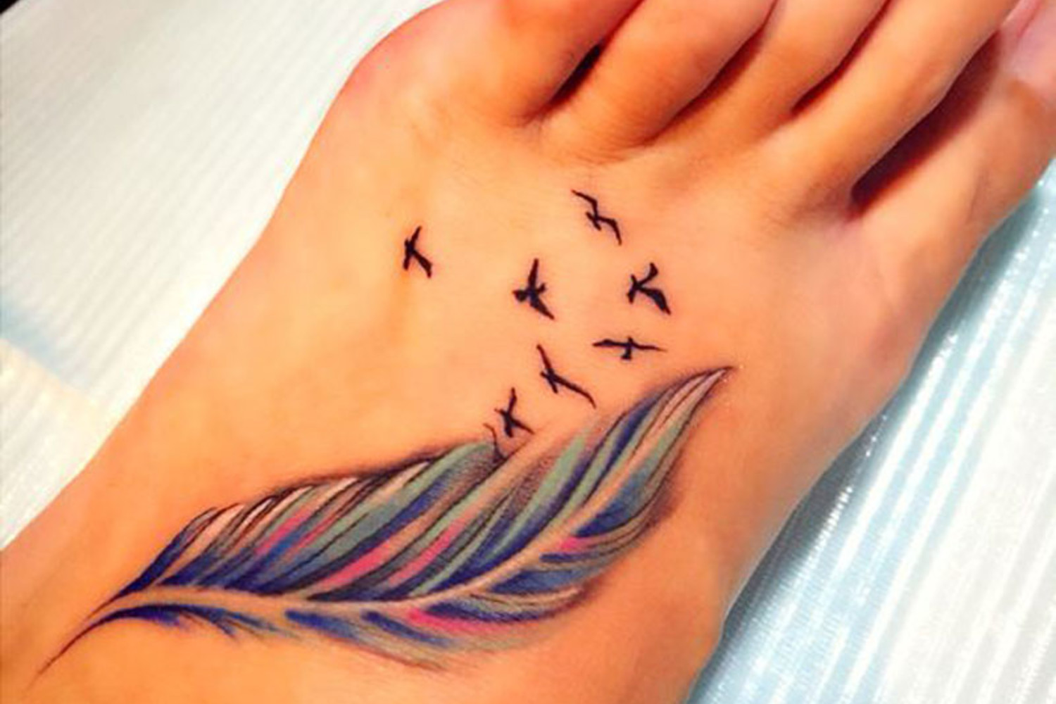 Remy Ma Feather Foot Tattoo  Steal Her Style