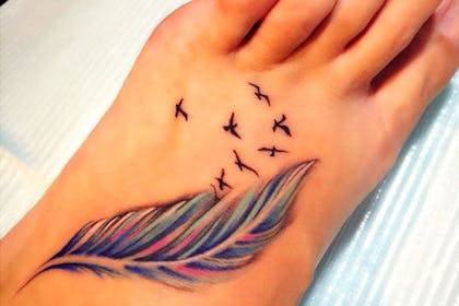 Foot feather tattoo