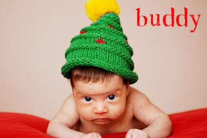 Baby in a Christmas tree hat