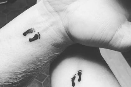 Matching footprints miscarriage tattoo