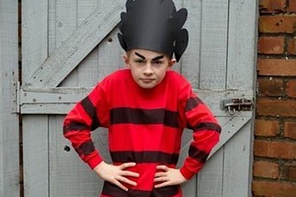 Boy dressed in Dennis the Menace costume
