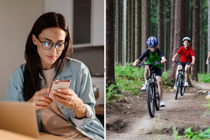 A mum on her phone and children biking in the woods