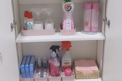 Stacey Solomon shows her very organised cupboard full of pink cleaning products 