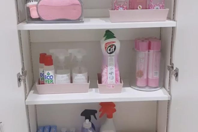 Stacey Solomon shows her very organised cupboard full of pink cleaning products 