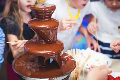 Kids enjoying a chocolate fondue