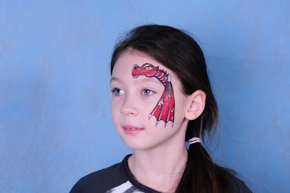 Dragon face painting on a child