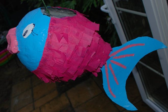 Paper mâché piñata that looks like a tropical fish