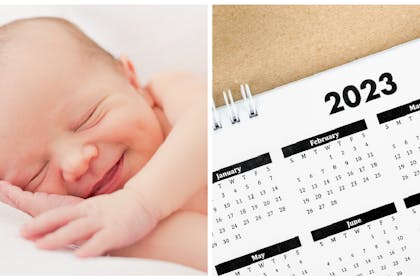 smiling baby and calendar