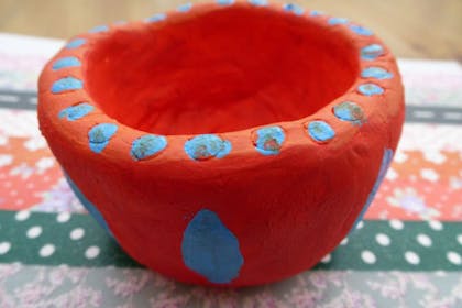 red and blue clay bowl