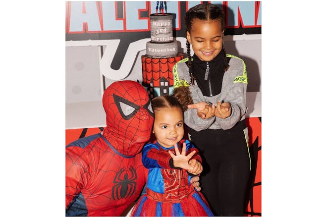 Valentina and Alaia Humes with person dressed as Spiderman 