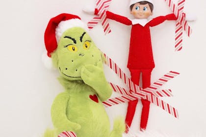 The Grinch attacking Elf on the Shelf