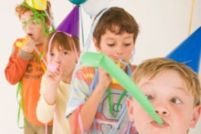 children at party with balloons