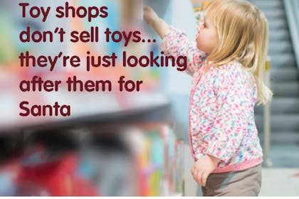 little girl in toy shop