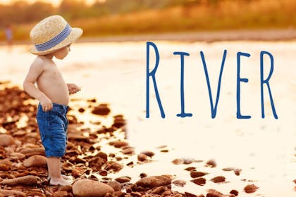 child standing next to river - River baby name