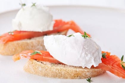 Poached eggs and salmon on toast