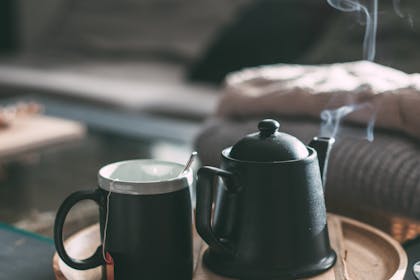 Steaming pot of tea