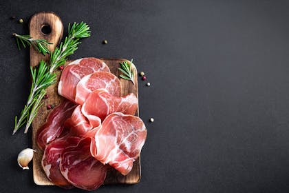 Parma ham on a wooden board