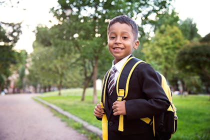Child in school uniform back to school photo