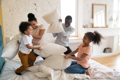 Family having a pillow fight