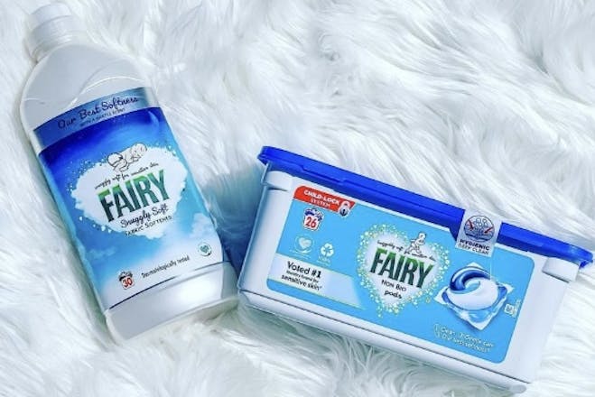 Fairy Non Bio Pods and Fairy fabric conditioner on a white fur background