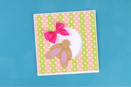 Bunny tail disappearing down rabbit hole card