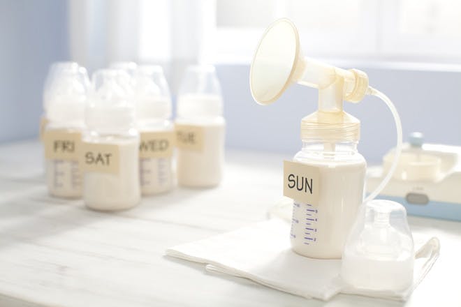 expressed breast milk in bottles with breast pump