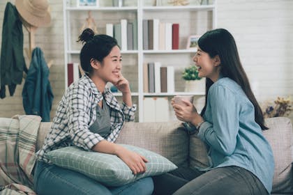 Two women gossiping