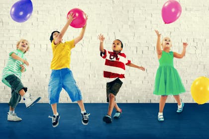 Children playing with balloons 