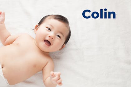 Baby smiling at camera. Name Colin written in text