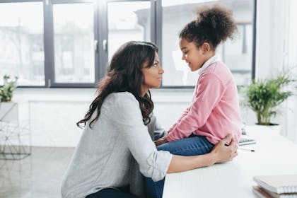 Mum talking to her child