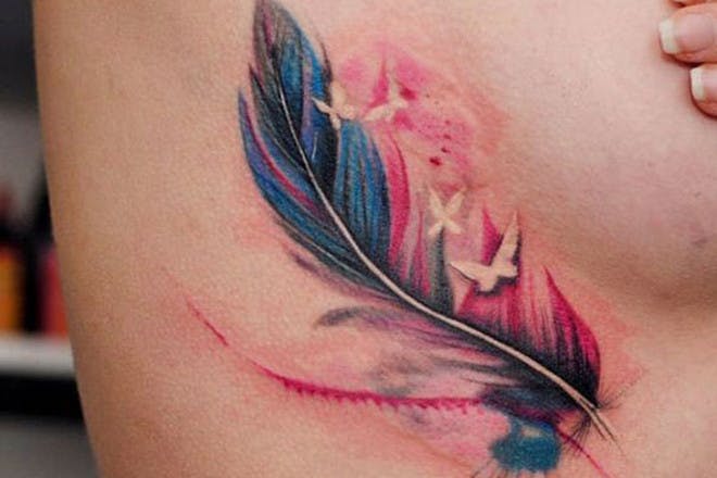 Colourful feather tattoo