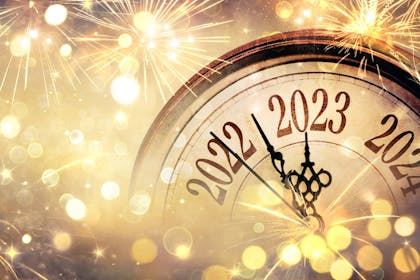 Happy New Year clock 2023 with fireworks